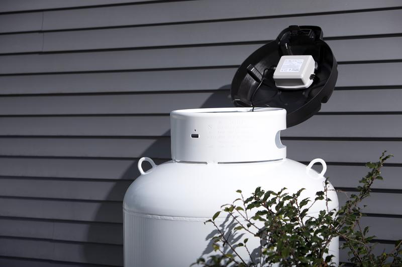 White tank against a house