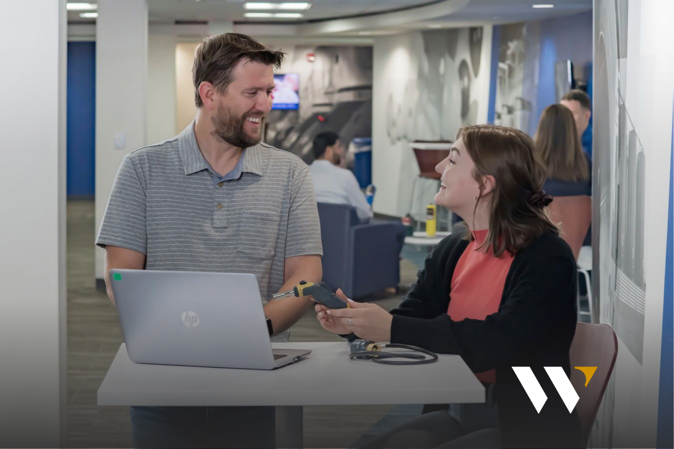 Man and woman discussing torch